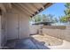 Secluded back patio with stucco walls, offering an enclosed outdoor space at 1961 N Hartford St # 1055, Chandler, AZ 85225