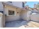 Private back patio features stucco walls and access to the home's exterior at 1961 N Hartford St # 1055, Chandler, AZ 85225