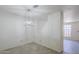 Open dining room features tile floors, white walls and a decorative pendant lighting fixture at 1961 N Hartford St # 1055, Chandler, AZ 85225