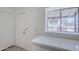 Kitchen features quartz countertops, a view to the outside and lots of cabinet space at 1961 N Hartford St # 1055, Chandler, AZ 85225
