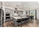 Spacious gray kitchen with stainless steel appliances and a large center island at 20451 E Via De Colina --, Queen Creek, AZ 85142