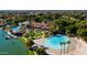Aerial view showcasing lakefront community amenities with beach, pools and waterfront dining at 2128 E Clipper Ln, Gilbert, AZ 85234
