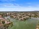 Wide aerial shot showcasing the lakefront community featuring diverse homes and well-kept landscaping at 2128 E Clipper Ln, Gilbert, AZ 85234