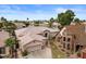 Beautiful single-Gathering home with manicured landscaping and charming architectural details under a bright sky at 2128 E Clipper Ln, Gilbert, AZ 85234