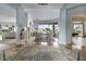 Elegant foyer featuring marble flooring, an ornate rug, and a bright living area with lake views at 2128 E Clipper Ln, Gilbert, AZ 85234
