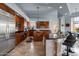 Modern kitchen with granite countertops, stainless steel appliances, and a central island at 2128 E Clipper Ln, Gilbert, AZ 85234