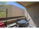 Private balcony features an outdoor dining table with seating, offering a relaxing space for outdoor living at 2228 N 52 St # 213, Phoenix, AZ 85008