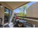 Private balcony features an outdoor dining table with seating, offering a relaxing space for outdoor living at 2228 N 52 St # 213, Phoenix, AZ 85008