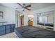 Spacious bedroom with an en-suite bathroom and built in shelves at 2228 N 52 St # 213, Phoenix, AZ 85008