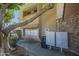 Exterior showcases mailboxes and neutral colors with mature landscaping at 2228 N 52 St # 213, Phoenix, AZ 85008