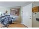 Home office space with desk, chair, and natural light at 2228 N 52 St # 213, Phoenix, AZ 85008