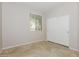 Bright bedroom with closet, window, and neutral paint scheme at 2475 E Vermont Dr, Gilbert, AZ 85295