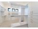 Well-organized walk-in closet with built-in shelving and drawers for maximum storage at 25564 N 119Th St, Scottsdale, AZ 85255