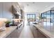 Gourmet kitchen has stainless steel appliances, and center island with countertop seating at 25564 N 119Th St, Scottsdale, AZ 85255
