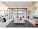 Spacious living room with stylish decor and seamless indoor-outdoor flow at 25564 N 119Th St, Scottsdale, AZ 85255