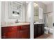 Dual vanities in bathroom featuring matching mirror frames and cabinetry at 2892 E Fruitvale Ave, Gilbert, AZ 85297