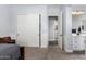 Spacious bedroom shows closet and bathroom access and modern neutral color palette at 2892 E Fruitvale Ave, Gilbert, AZ 85297