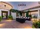 Charming Casita featuring an outdoor seating area surrounded by lush landscaping at 2892 E Fruitvale Ave, Gilbert, AZ 85297