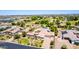 An expansive property featuring a home, swimming pool, basketball court and mature trees and landscaping at 2892 E Fruitvale Ave, Gilbert, AZ 85297