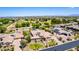 A beautiful estate featuring a large lot, stone house, pool, and outdoor basketball court at 2892 E Fruitvale Ave, Gilbert, AZ 85297