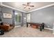 Game room featuring a ceiling fan, a game table, and natural light at 2892 E Fruitvale Ave, Gilbert, AZ 85297