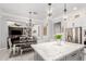 Open-concept kitchen with an island and an eat-in dining area that connects to the living room at 2892 E Fruitvale Ave, Gilbert, AZ 85297