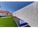 Amazing backyard space with artificial grass, basketball court, and beer pong setup at 2940 E Norwood St, Mesa, AZ 85213