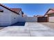 Spacious paved backyard providing ample space for outdoor activities and low-maintenance landscaping at 2940 E Norwood St, Mesa, AZ 85213
