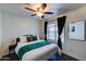 Cozy bedroom featuring a comfortable bed, modern decor, and a relaxing ambiance at 2940 E Norwood St, Mesa, AZ 85213