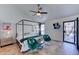 Comfortable bedroom showcasing a four-poster bed, stylish furnishings, and a calming atmosphere at 2940 E Norwood St, Mesa, AZ 85213