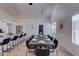Bright dining room featuring an eat-in kitchen and a large table with seating for ten, perfect for entertaining at 2940 E Norwood St, Mesa, AZ 85213