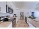 The kitchen features stainless steel appliances, bright cabinets, a breakfast bar, and an easy access dining area at 2940 E Norwood St, Mesa, AZ 85213