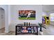 Comfortable living room with a ceiling fan, wall-mounted TV and contemporary decor at 2940 E Norwood St, Mesa, AZ 85213