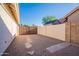 Low maintenance backyard featuring rock cover and block fencing at 3058 E Nance St, Mesa, AZ 85213
