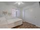 Bedroom features hardwood floors, a ceiling fan, and a closet at 3058 E Nance St, Mesa, AZ 85213
