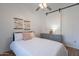 Cozy bedroom with a comfortable bed, sliding door, and classic decorations at 3058 E Nance St, Mesa, AZ 85213