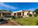 Beautiful backyard with pool, spa, and manicured lawn at 320 N Portland Ave, Gilbert, AZ 85234