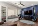 Cozy bedroom with built-in shelves, daybed, desk and a vivid accent wall at 320 N Portland Ave, Gilbert, AZ 85234