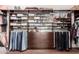 Organized walk-in closet with custom shelving, drawers, and ample hanging space at 320 N Portland Ave, Gilbert, AZ 85234