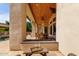 Relaxing outdoor patio with fire pit and views of the pool area at 320 N Portland Ave, Gilbert, AZ 85234