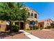 Charming two-story home with a desert landscape and walkway to the front door at 3476 E Orchid Ln, Gilbert, AZ 85296