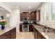 Well-appointed kitchen featuring granite counters and stainless steel appliances at 3476 E Orchid Ln, Gilbert, AZ 85296