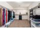 Large walk-in closet featuring ample shelving, clothing racks, and organized storage solutions at 3476 E Orchid Ln, Gilbert, AZ 85296