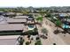 Aerial neighborhood view showcasing a pool amid residential homes, highlighting community features at 35654 N Vidlak Dr, San Tan Valley, AZ 85143