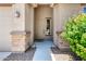 Charming entryway with stone accents and desert landscaping welcomes you home at 35654 N Vidlak Dr, San Tan Valley, AZ 85143