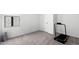 Bedroom with carpet, natural light, plus a treadmill, ready for a workout at 38099 N Stallion St, San Tan Valley, AZ 85140