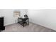 Study with carpet, natural light, and black desk perfect for an office or student at 38099 N Stallion St, San Tan Valley, AZ 85140