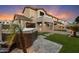Gorgeous backyard features lush landscaping, and a relaxing hot tub is perfect for unwinding at the end of the day at 3932 S Crosscreek Dr, Chandler, AZ 85286