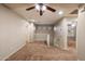 Hallway landing area upstairs with neutral carpet and paint and a ceiling fan at 3932 S Crosscreek Dr, Chandler, AZ 85286