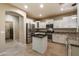 Bright kitchen with an island, granite countertops, and stainless steel appliances at 3932 S Crosscreek Dr, Chandler, AZ 85286
